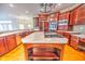 Gourmet kitchen boasts a large island with quartz countertops and stainless steel appliances at 808 Copperfield Xing, Danville, IN 46122
