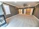 Large main bedroom with double doors and carpet flooring at 808 Copperfield Xing, Danville, IN 46122