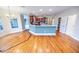 Bright dining room with hardwood floors and views to kitchen at 808 Copperfield Xing, Danville, IN 46122