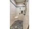 Spa-like shower with pebble floor and modern fixtures at 808 Copperfield Xing, Danville, IN 46122