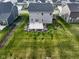 Aerial view showing house, backyard and surrounding neighborhood at 16703 Ayshire Dr, Fishers, IN 46037