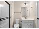 Clean basement bathroom, featuring a shower, toilet and vanity at 16703 Ayshire Dr, Fishers, IN 46037