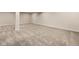 Large finished basement with neutral carpeting, ideal for recreation at 16703 Ayshire Dr, Fishers, IN 46037