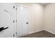 Finished basement room with a door and neutral walls at 16703 Ayshire Dr, Fishers, IN 46037
