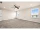 Bright bedroom featuring neutral walls and ceiling fan at 16703 Ayshire Dr, Fishers, IN 46037