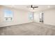 Spacious bedroom with neutral carpeting and ceiling fan at 16703 Ayshire Dr, Fishers, IN 46037