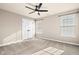 Bedroom with two windows, ceiling fan and carpet at 16703 Ayshire Dr, Fishers, IN 46037