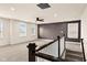 Spacious bonus room with three windows and a ceiling fan at 16703 Ayshire Dr, Fishers, IN 46037