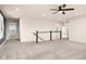 Bonus room with neutral walls, carpet, and multiple doorways at 16703 Ayshire Dr, Fishers, IN 46037