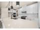 Modern kitchen with white cabinets and quartz countertops at 16703 Ayshire Dr, Fishers, IN 46037