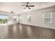 Large living room with hardwood floors and sliding glass doors at 16703 Ayshire Dr, Fishers, IN 46037