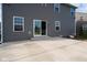 Concrete patio with sliding glass door access from the house at 16703 Ayshire Dr, Fishers, IN 46037