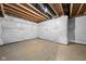 Unfinished basement area with exposed utilities and concrete flooring at 16703 Ayshire Dr, Fishers, IN 46037