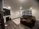 Spacious living room featuring a sectional sofa and fireplace at 3609 Merchmont Rd, Bargersville, IN 46106