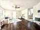Spacious living room with hardwood floors and large windows at 2641 Guilford Ave, Indianapolis, IN 46205