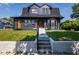 Charming two-story home with dark exterior and lawn at 2641 Guilford Ave, Indianapolis, IN 46205