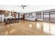 Open concept living room with hardwood floors and kitchen at 1521 N Alabama St # L, Indianapolis, IN 46202