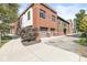 Brick building with attached garages and a walkway at 1521 N Alabama St # L, Indianapolis, IN 46202