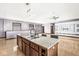 Granite kitchen island with seating and double sink at 1521 N Alabama St # L, Indianapolis, IN 46202