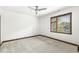 Bedroom with ceiling fan and neutral carpeting at 1521 N Alabama St # L, Indianapolis, IN 46202