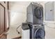 Laundry room with stackable washer and dryer at 1521 N Alabama St # L, Indianapolis, IN 46202