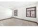 Bright bedroom with neutral carpeting and large windows at 1521 N Alabama St # L, Indianapolis, IN 46202