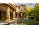 Home's exterior showcasing a stone and brick design with a covered patio at 9468 Sullivan Pl, Zionsville, IN 46077