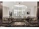 Large kitchen island with granite countertop and stainless steel sink at 9468 Sullivan Pl, Zionsville, IN 46077