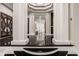 Bright entryway with high ceilings and black and white flooring at 9468 Sullivan Pl, Zionsville, IN 46077