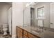 Bathroom with a shower, toilet, and double vanity with granite countertop at 9468 Sullivan Pl, Zionsville, IN 46077