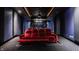State-of-the-art home theater with comfortable seating and a large projection screen at 9468 Sullivan Pl, Zionsville, IN 46077