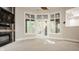 Spacious basement recreation area with fireplace and backyard access at 9468 Sullivan Pl, Zionsville, IN 46077
