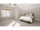 Bright bedroom with a comfortable bed and large window at 9468 Sullivan Pl, Zionsville, IN 46077