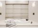 Relaxing bathroom features a luxurious soaking tub and serene window coverings at 9468 Sullivan Pl, Zionsville, IN 46077