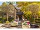 Brick house exterior with landscaping and large planters at 9468 Sullivan Pl, Zionsville, IN 46077
