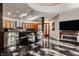 Open concept kitchen with stainless steel appliances and breakfast nook at 9468 Sullivan Pl, Zionsville, IN 46077