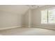 Bright bedroom featuring a large window and neutral decor at 9468 Sullivan Pl, Zionsville, IN 46077
