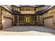 Brick house with two-car garage and a courtyard at 9468 Sullivan Pl, Zionsville, IN 46077