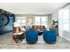 Relaxing living room with leather sofas and a wood accent wall at 18425 Depoe Ln, Westfield, IN 46074