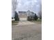 Brick two-story house with attached garage and landscaping at 719 Trent Dr, Greenwood, IN 46143