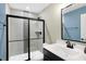 Modern bathroom with a walk-in shower and updated vanity at 12594 Tidecrest Dr, Fishers, IN 46037