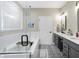 Bright bathroom with double vanity, soaking tub, and glass shower at 12594 Tidecrest Dr, Fishers, IN 46037