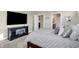 Spacious bedroom with large TV, ample closet space, and neutral decor at 12594 Tidecrest Dr, Fishers, IN 46037