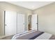 Spacious bedroom with double doors and carpet flooring at 12594 Tidecrest Dr, Fishers, IN 46037