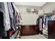 Large walk-in closet with shelving and dresser at 12594 Tidecrest Dr, Fishers, IN 46037