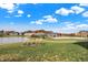 Community playground and pond with homes at 12594 Tidecrest Dr, Fishers, IN 46037