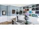 Bright home office with a desk, chair, and a record wall at 12594 Tidecrest Dr, Fishers, IN 46037