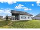House exterior showcasing back porch and yard at 12594 Tidecrest Dr, Fishers, IN 46037