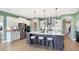 Modern kitchen with stainless steel appliances and large island with seating at 12594 Tidecrest Dr, Fishers, IN 46037