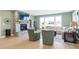 Spacious living room features a cozy fireplace and large windows with scenic views at 12594 Tidecrest Dr, Fishers, IN 46037